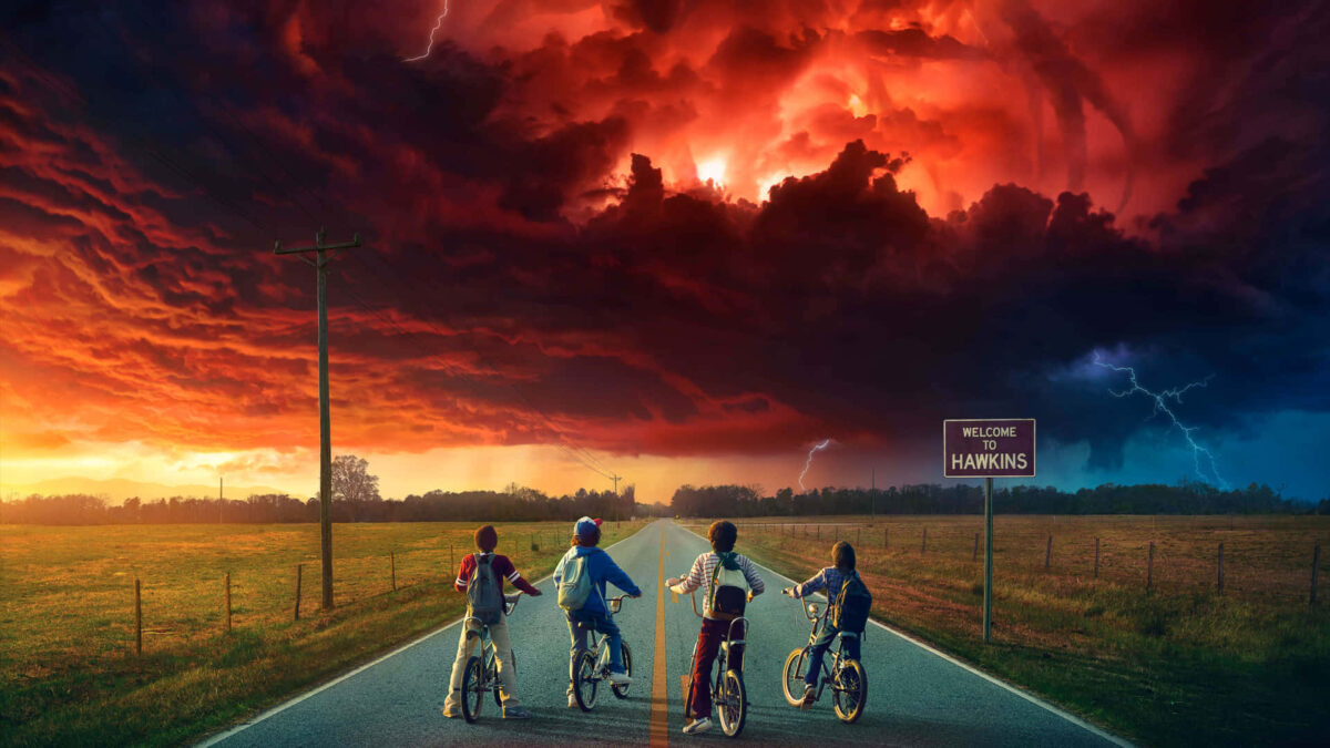 Stranger Things promotional image featuring the Hawkins kids and Upside Down horror vibe